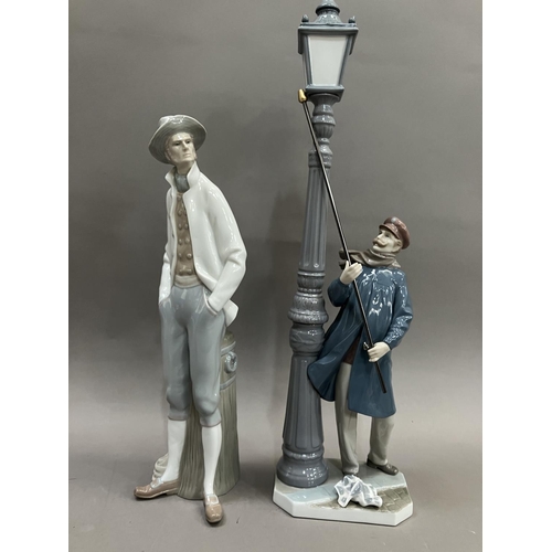 75 - A Lladro figure of a Lamplighter, no.5205 48cm high and a figure of a Sailor no.4657