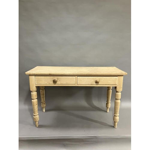 167 - A stripped pine kitchen table having two drawers on turned legs 120cm wide x 49cm deep x 76cm high