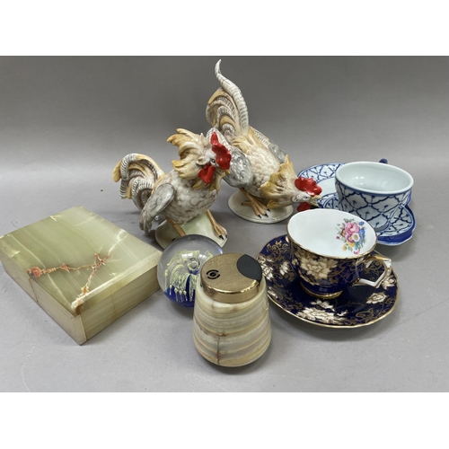 204 - An agate lidded trinket box, an agate table lighter, a pair of pottery cockerels, cabinet cup and sa... 