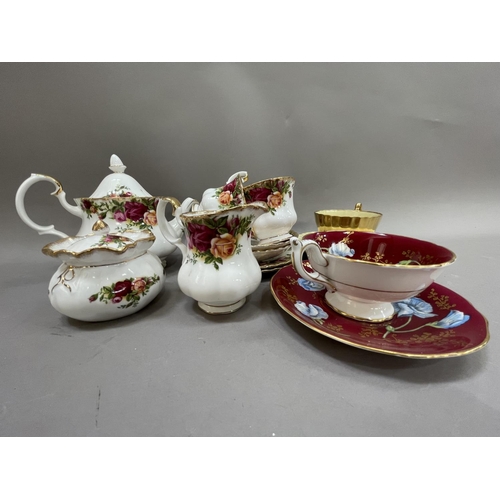 195 - A Royal Albert Old Country Roses tea service comprising teapot, milk jug, sugar bowl, two cups and s... 