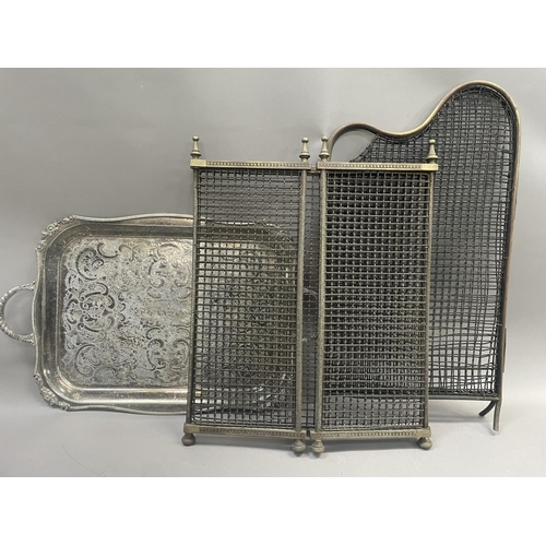 224 - An EPNS twin handled serving tray with etched centre and two fire guards