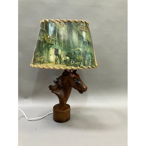 91 - A lamp modelled as a composite horses head on round plinth base, 50cm high