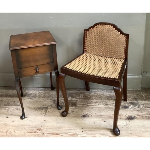 132 - A cane seated mahogany bedroom chair together with a mahogany sewing box with single drawer on cabri... 