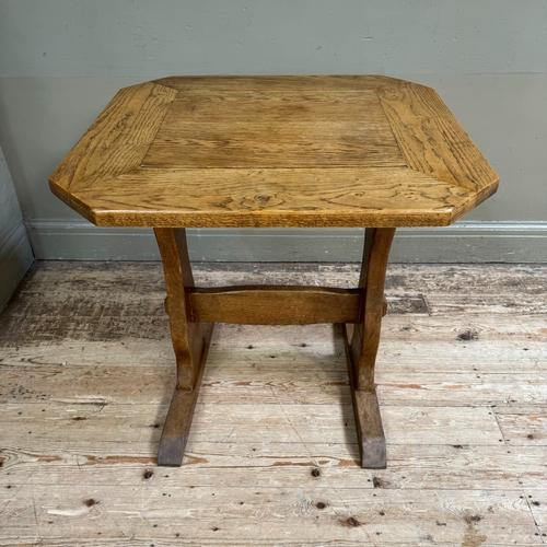 352 - A small oak refectory table on shaped standards joined by a stretcher, 70cm x 64cm x 70cm