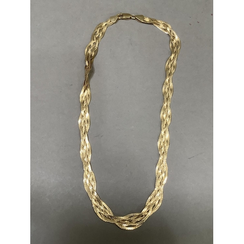 291 - A necklace in woven snake link chain (tests as 14ct gold), approx. weight 16g