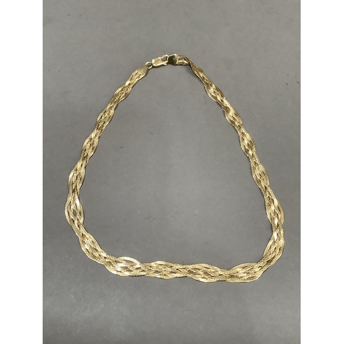 291 - A necklace in woven snake link chain (tests as 14ct gold), approx. weight 16g