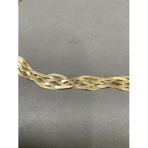 291 - A necklace in woven snake link chain (tests as 14ct gold), approx. weight 16g