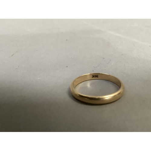 285 - A wedding ring in yellow metal (tests as 14ct gold) finger size 'O', approx. weight 2g