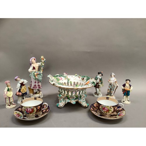 93 - A collection of 19th century continental and English porcelain including a pierced basket encrusted ... 