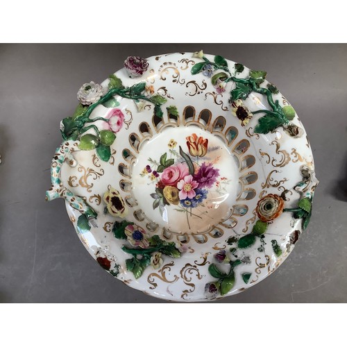 93 - A collection of 19th century continental and English porcelain including a pierced basket encrusted ... 