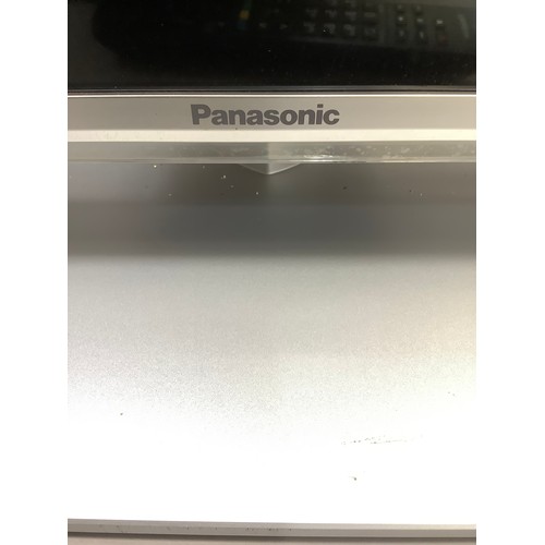 157 - A Panasonic flat screen TV on a stand