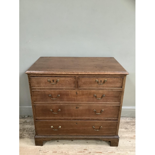 297 - A Victorian oak chest of drawers, two short over three long drawers with swan-neck handles on bracke... 