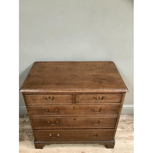 297 - A Victorian oak chest of drawers, two short over three long drawers with swan-neck handles on bracke... 