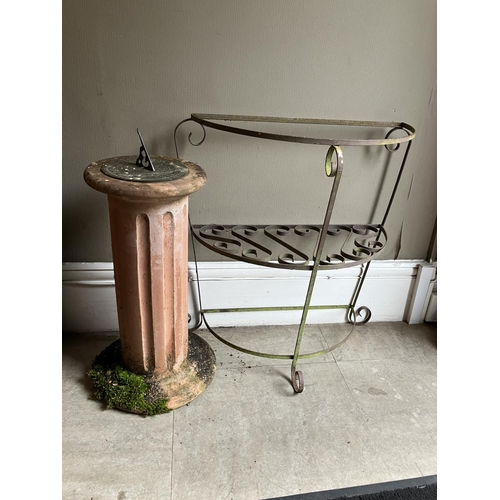 400 - A sundial on terracotta plinth together with a garden plant stand