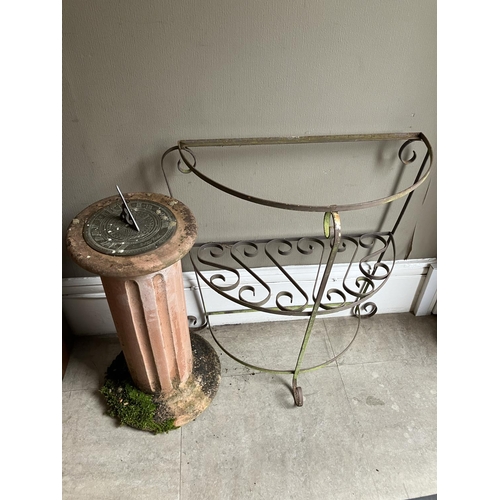 400 - A sundial on terracotta plinth together with a garden plant stand