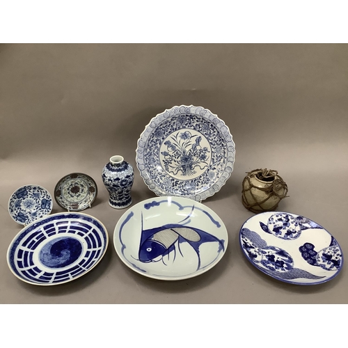 240 - A collection of early 20th century and later Chinese blue and white ware including a bluster vase pa... 