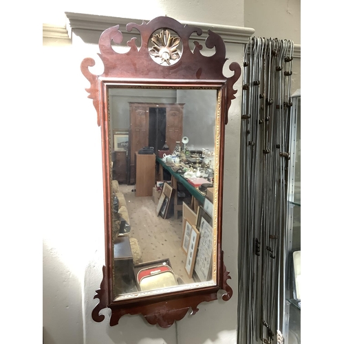 344 - A Georgian style mahogany rectangular wall mirror with fretwork frame, 94cm x 47cm