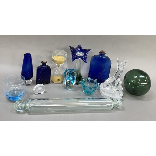 190 - A collection of 19th century and later glassware comprising a glass rolling pin, two blue moulded gl... 