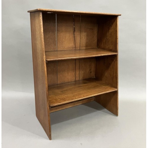 349 - An oak open bookcase of tapered form 54cm x 72cm