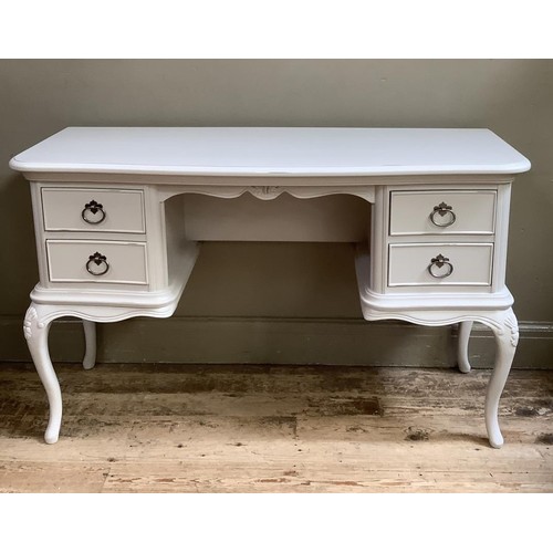 357 - A cream painted serpentine fronted dressing table having two drawers to either side of a kneehols, o... 