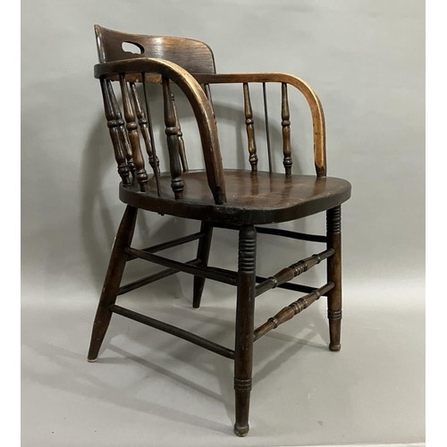 370 - A 20th century oak office chair on turned legs with turned stretchers