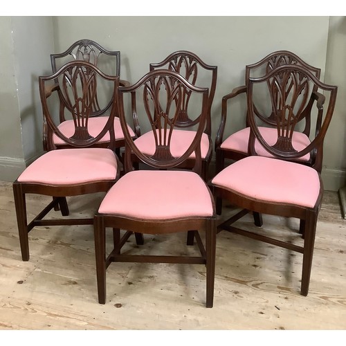 390 - Six  mahogany shield back dining chairs, serpentine seat rail, upholstered seat on fluted tapered le... 