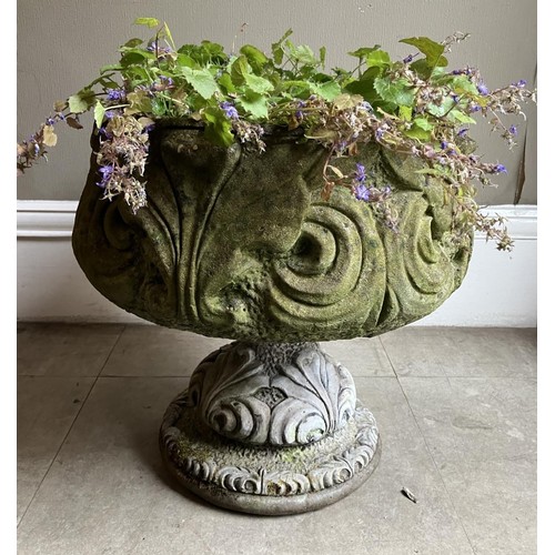 396 - A cast garden planter on pedestal foot, 47cm high