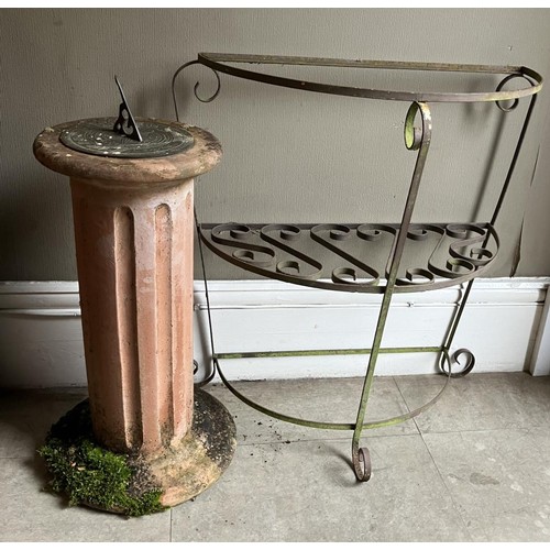 400 - A sundial on terracotta plinth together with a garden plant stand