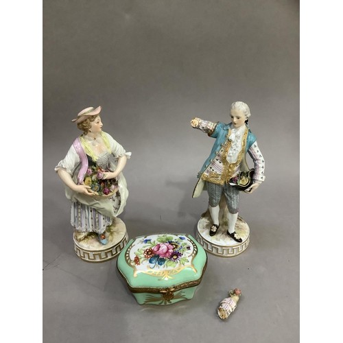 95 - A pair of early 19th century continental porcelain figures of a lady and gentleman in contemporary d... 