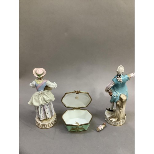 95 - A pair of early 19th century continental porcelain figures of a lady and gentleman in contemporary d... 