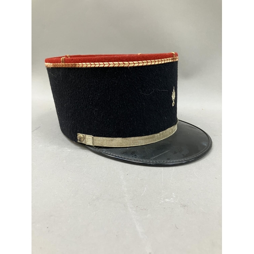 440 - A French military Kepi with red top and gilt embroidery, 11cm high