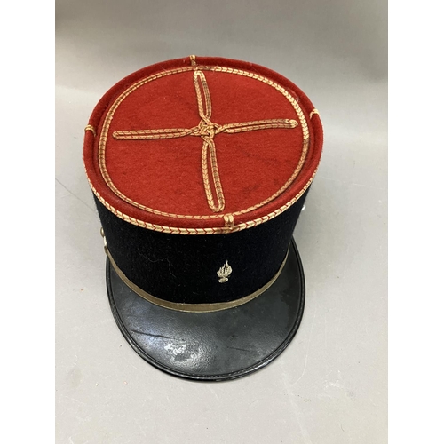 440 - A French military Kepi with red top and gilt embroidery, 11cm high