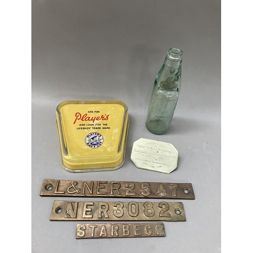 454 - A Player’s ashtray, three railway plaques and a Harston & Co marble bottle