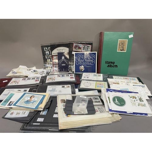 466 - A collection of GB first day covers and Channel Island stamps in three boxes, five albums together w... 