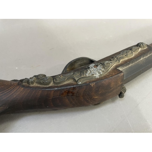 503 - A matchlock non-firing replica musket, 117cm long