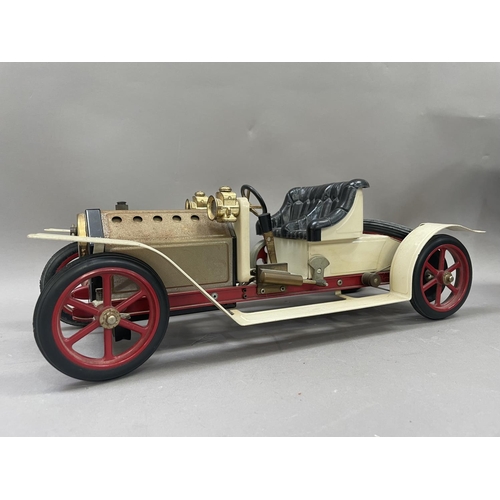 445 - A Mamod live steam roadster car, 39cm long together with a Mamod steam traction engine boxed