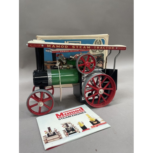 445 - A Mamod live steam roadster car, 39cm long together with a Mamod steam traction engine boxed