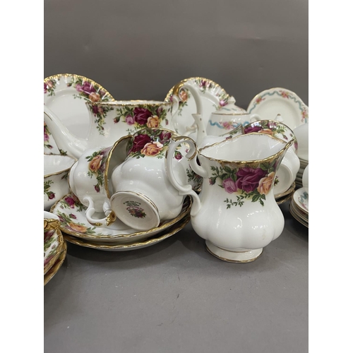 129 - A Royal Albert Old Country Roses tea set comprising teapot (without lid), sugar bowl, milk jug, six ... 