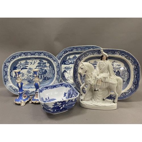 69 - A collection of three blue and white willow pattern meat plates, an early Spode bowl, a pair of moul... 