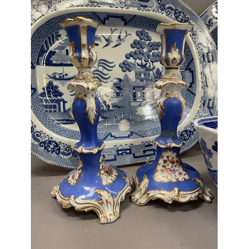 69 - A collection of three blue and white willow pattern meat plates, an early Spode bowl, a pair of moul... 