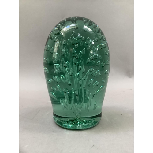 12 - A Victorian green glass dump with bubble inclusions, 15cm high