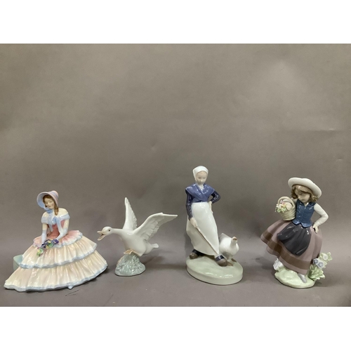 13 - A Royal Copenhagen figure of a Girl with Goose, together with a Lladro figure of a girl with flower ... 