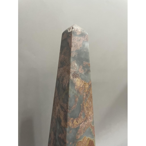 5 - A pair of grey and red marble table obelisks, 33cm high