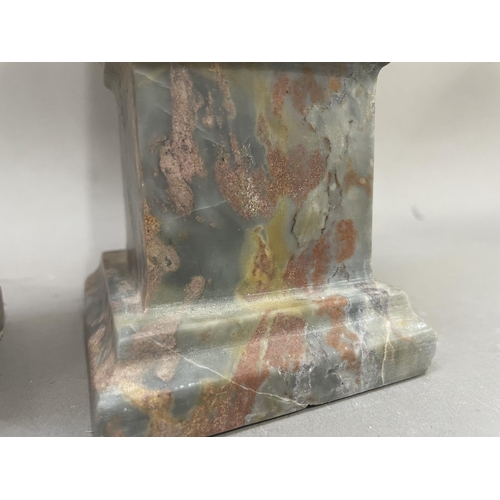 5 - A pair of grey and red marble table obelisks, 33cm high