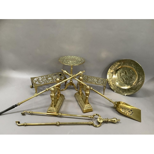 51 - A brass fireside companion set comprising tongs, poker and shovel together with an engraved brass tr... 