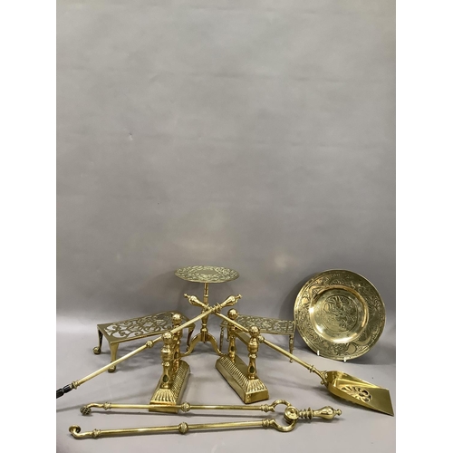 51 - A brass fireside companion set comprising tongs, poker and shovel together with an engraved brass tr... 