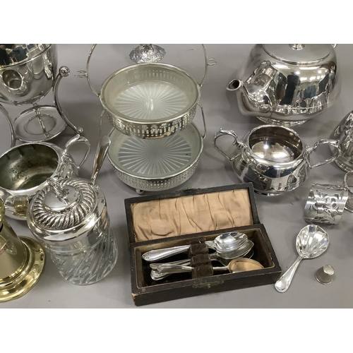 126 - A collection of silver plated ware to include a large candelabra, an egg coddler, a teapot,  sugar b... 