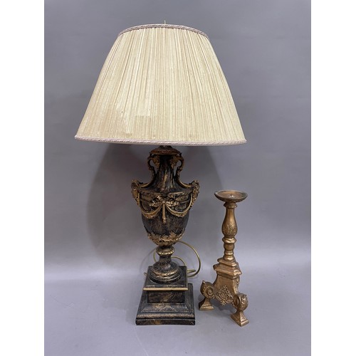 34 - A composite table lamp of campana urn form, having twin masks to the shoulders and swag decoration, ... 