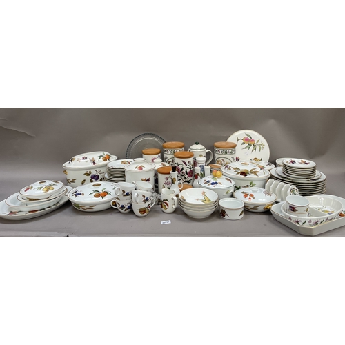 52 - A large collection of Royal Worcester Evesham tableware together with some Port Meirion Botanic Gard... 