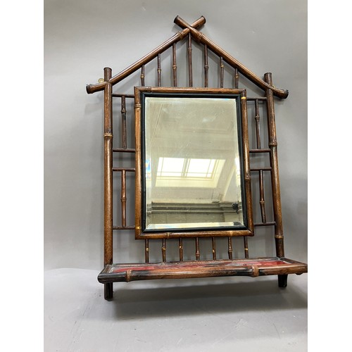 73 - A 19th century bamboo wall mirror, with Japanned lower shelf 62cm high together with a small bamboo ... 